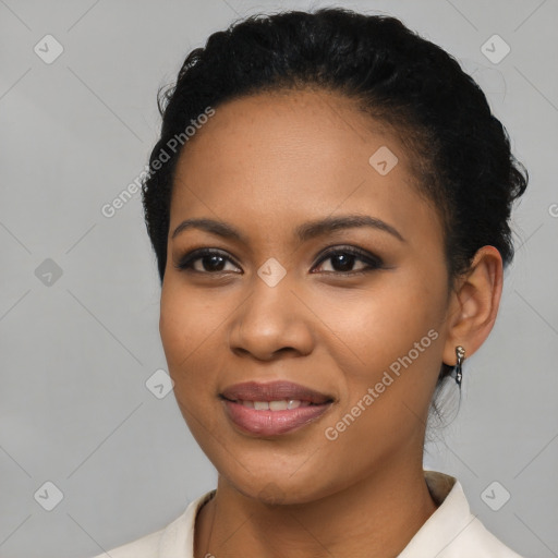 Joyful latino young-adult female with short  black hair and brown eyes