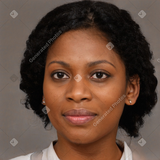 Joyful black young-adult female with medium  black hair and brown eyes