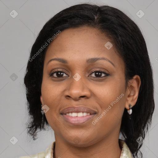 Joyful latino young-adult female with medium  brown hair and brown eyes