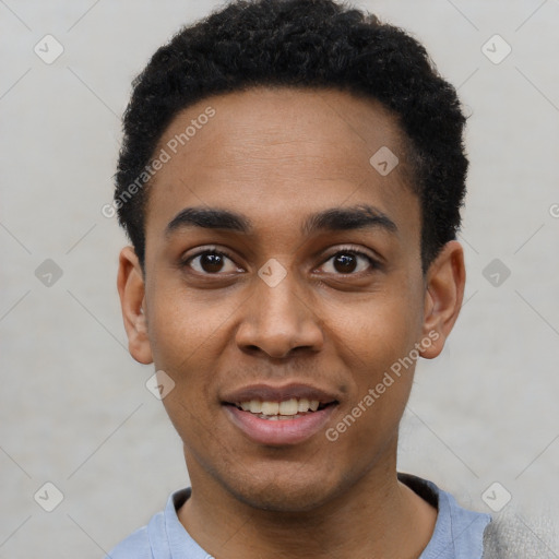 Joyful black young-adult male with short  black hair and brown eyes