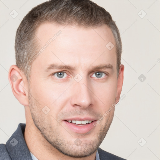 Joyful white young-adult male with short  brown hair and grey eyes