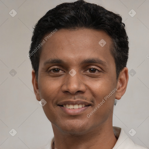 Joyful latino young-adult male with short  black hair and brown eyes