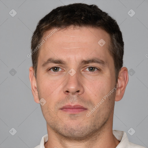 Neutral white adult male with short  brown hair and brown eyes