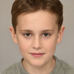 Joyful white child female with short  brown hair and brown eyes