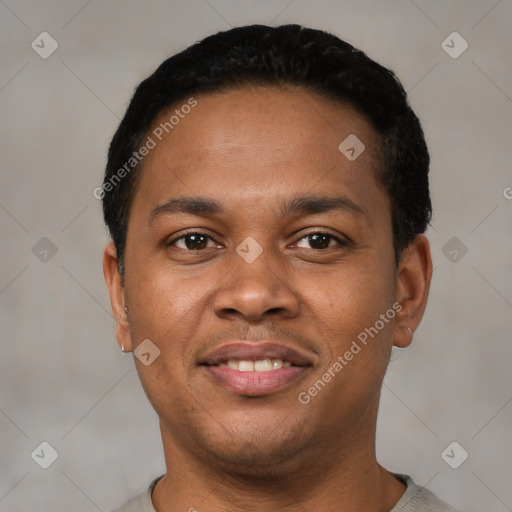 Joyful black young-adult male with short  black hair and brown eyes