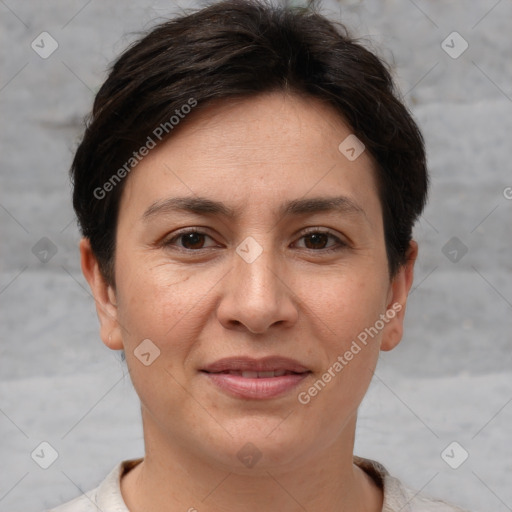 Joyful white adult female with short  brown hair and brown eyes