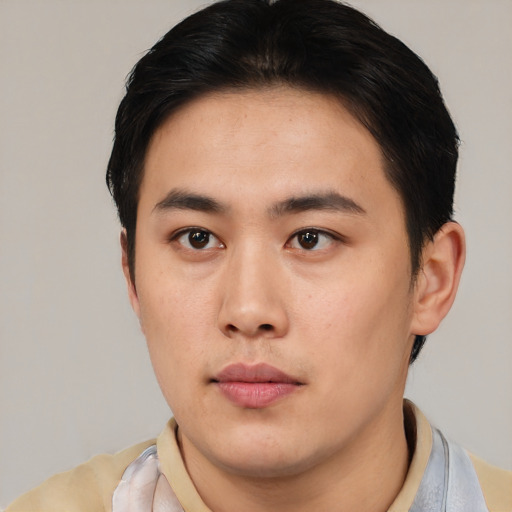 Neutral asian young-adult male with short  black hair and brown eyes