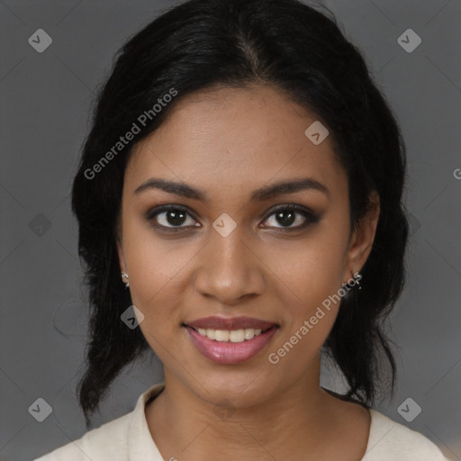 Joyful black young-adult female with medium  black hair and brown eyes