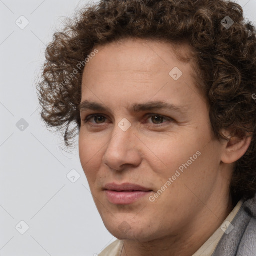 Joyful white young-adult male with medium  brown hair and brown eyes