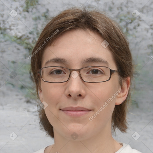 Joyful white adult female with medium  brown hair and green eyes