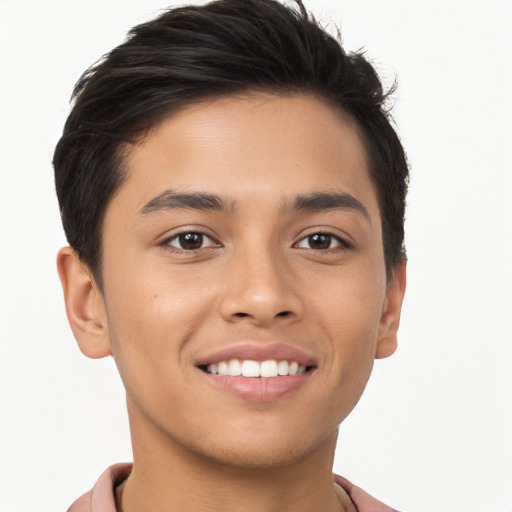 Joyful latino young-adult male with short  brown hair and brown eyes