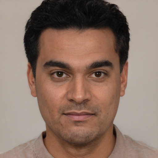 Neutral latino young-adult male with short  black hair and brown eyes