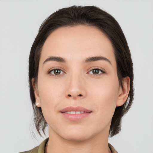 Neutral white young-adult female with medium  brown hair and brown eyes