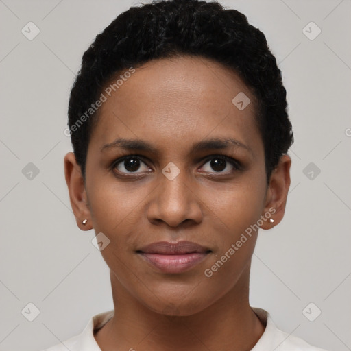 Joyful black young-adult female with short  black hair and brown eyes