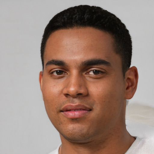 Neutral black young-adult male with short  black hair and brown eyes