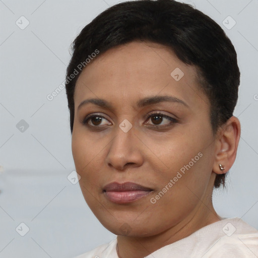 Joyful latino young-adult female with short  brown hair and brown eyes