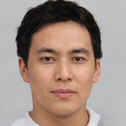 Neutral asian young-adult male with short  brown hair and brown eyes