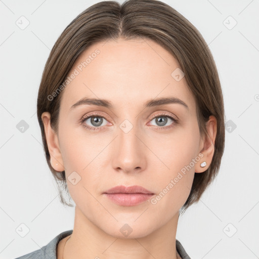 Neutral white young-adult female with medium  brown hair and grey eyes