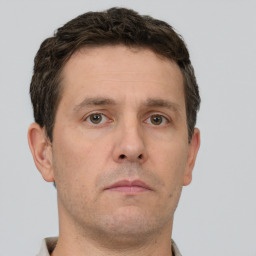 Neutral white adult male with short  brown hair and brown eyes