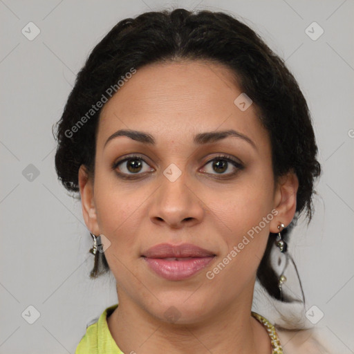 Joyful latino young-adult female with medium  brown hair and brown eyes