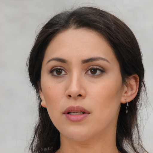 Neutral asian young-adult female with long  brown hair and brown eyes