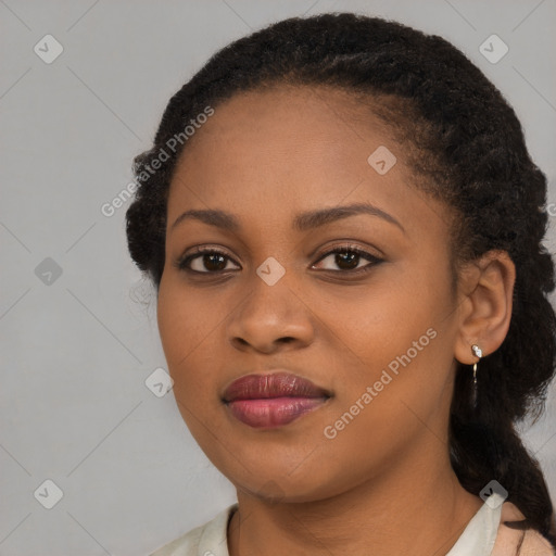 Joyful black young-adult female with medium  brown hair and brown eyes