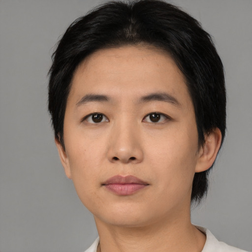 Neutral asian young-adult female with short  black hair and brown eyes
