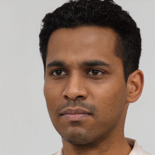 Neutral black young-adult male with short  black hair and brown eyes