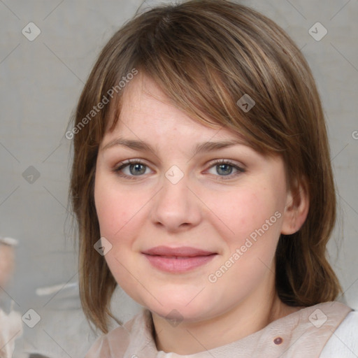 Joyful white young-adult female with medium  brown hair and blue eyes