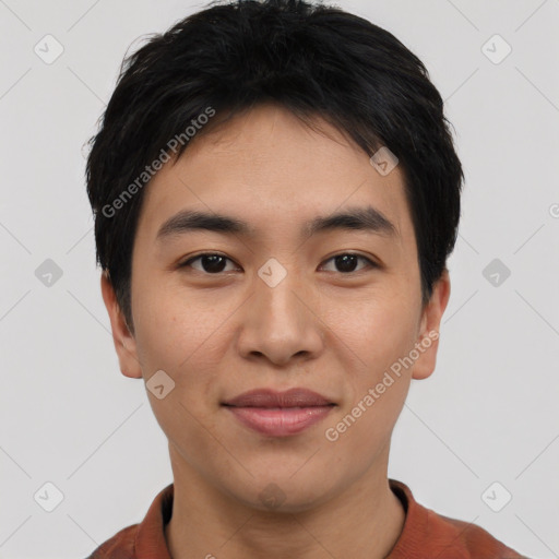 Joyful asian young-adult male with short  black hair and brown eyes