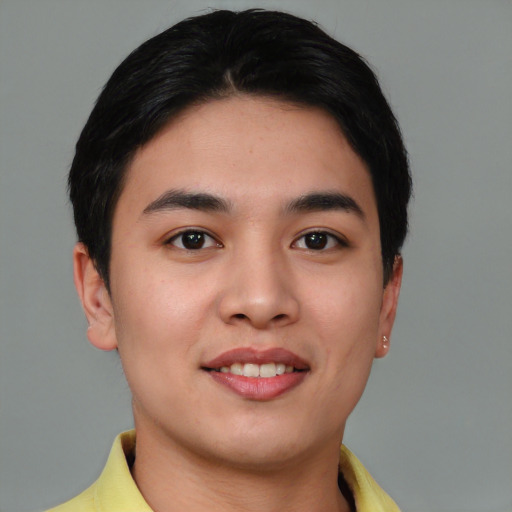 Joyful asian young-adult female with short  brown hair and brown eyes