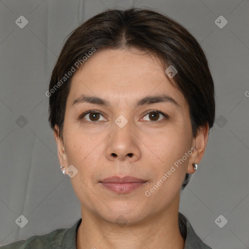 Joyful white adult female with short  brown hair and brown eyes