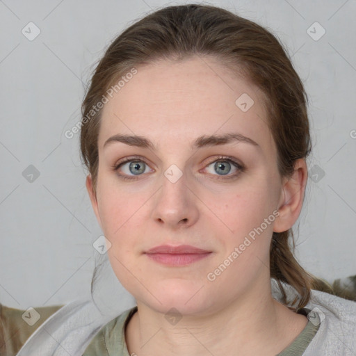 Neutral white young-adult female with medium  brown hair and grey eyes