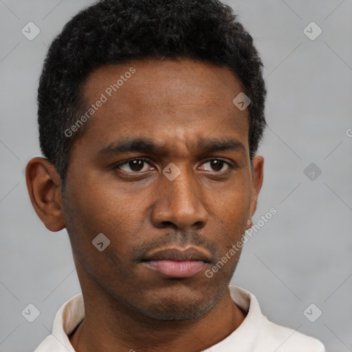 Neutral latino young-adult male with short  black hair and brown eyes