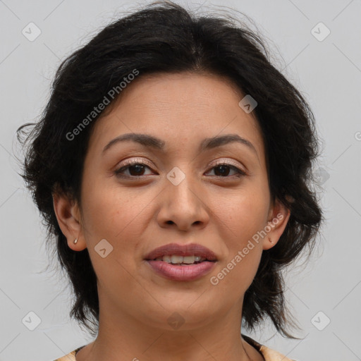 Joyful asian adult female with medium  brown hair and brown eyes