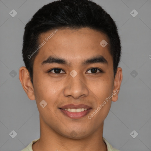 Joyful latino young-adult male with short  black hair and brown eyes