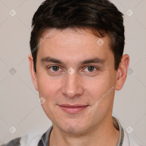 Joyful white young-adult male with short  brown hair and brown eyes