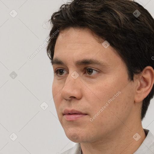 Neutral white adult male with short  brown hair and brown eyes