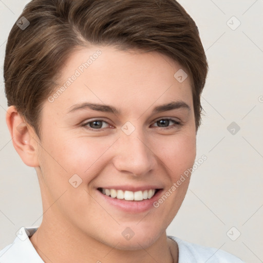 Joyful white young-adult female with short  brown hair and brown eyes