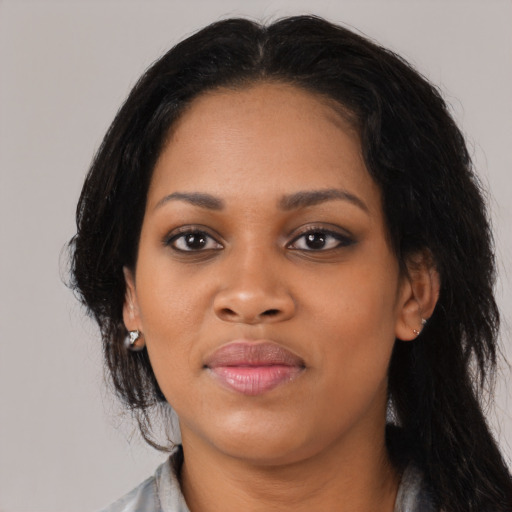 Joyful asian young-adult female with medium  black hair and brown eyes