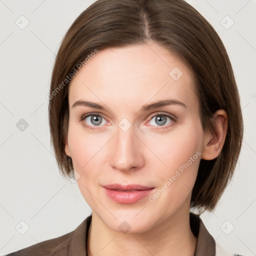 Neutral white young-adult female with medium  brown hair and grey eyes