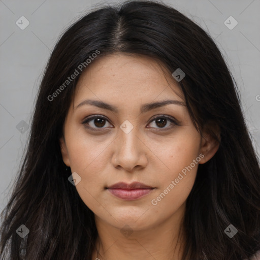 Joyful latino young-adult female with long  brown hair and brown eyes