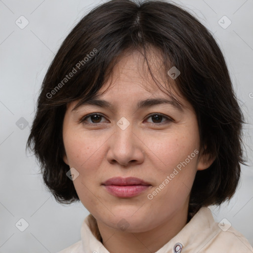 Joyful white adult female with medium  brown hair and brown eyes