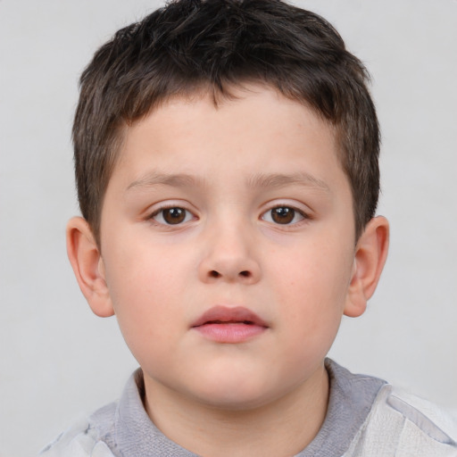 Neutral white child male with short  brown hair and brown eyes