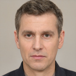 Neutral white adult male with short  brown hair and brown eyes