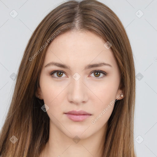 Neutral white young-adult female with long  brown hair and brown eyes