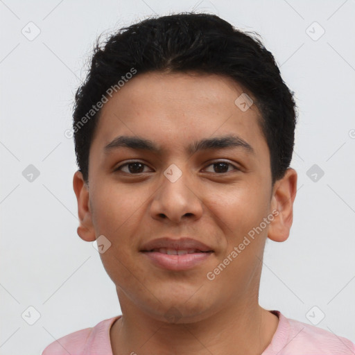 Joyful latino young-adult male with short  brown hair and brown eyes