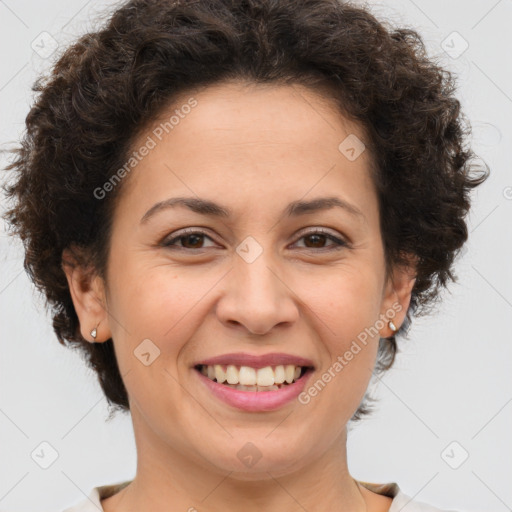 Joyful white adult female with short  brown hair and brown eyes