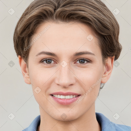 Joyful white young-adult female with short  brown hair and grey eyes