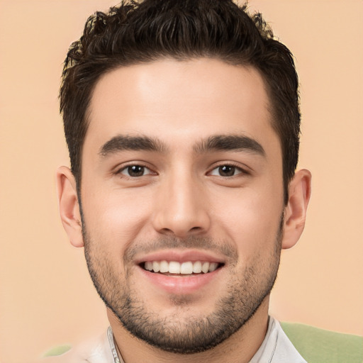 Joyful white young-adult male with short  black hair and brown eyes